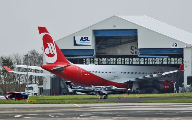 Airbus A330-300 (D-ALPF) - air berlin a330-223 d-alpf in the asl hanger at shannon 6/11/17.