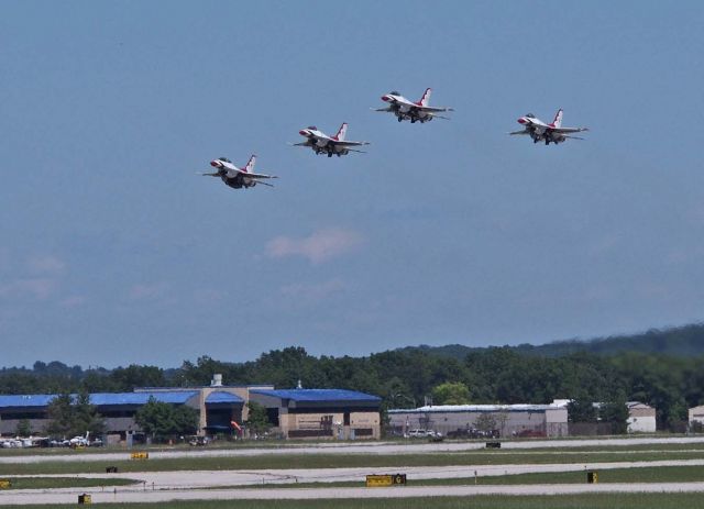 Lockheed F-16 Fighting Falcon — - Cherry Festival time in Traverse City, Michigan.br /I was standing off either the east or west ends of the main runway.  Commercial traffic departed to the east, military airshow traffic departed to the west.