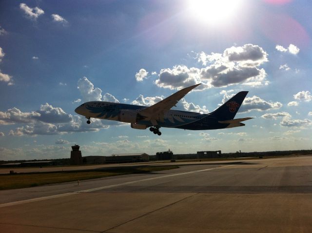 Boeing 787-8 — - Leaving KFTW for KCHS after a new paint job. (Aug 12, 2013)