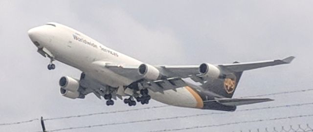Boeing 747-400 (N580UP) - Frontage road at the end of the east-west runway, Anchorage International Airport