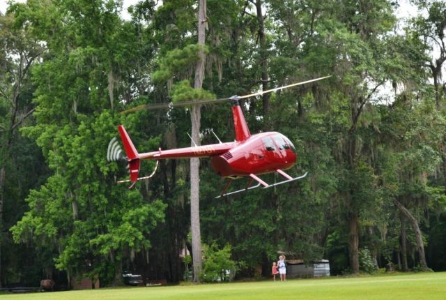 Robinson R-44 (N27GT) - Visiting family at the Raines Plantation, Welborn Florida.  (photo by Beth Lawton)