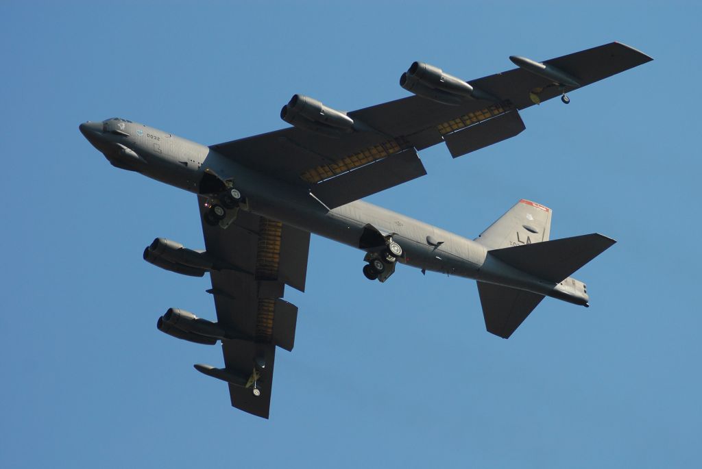 Boeing B-52 Stratofortress (56-0032) - A B-52 from Barksdale AFB doing touch-and-go landings between a B-2 and T-38 at Whiteman AFB.