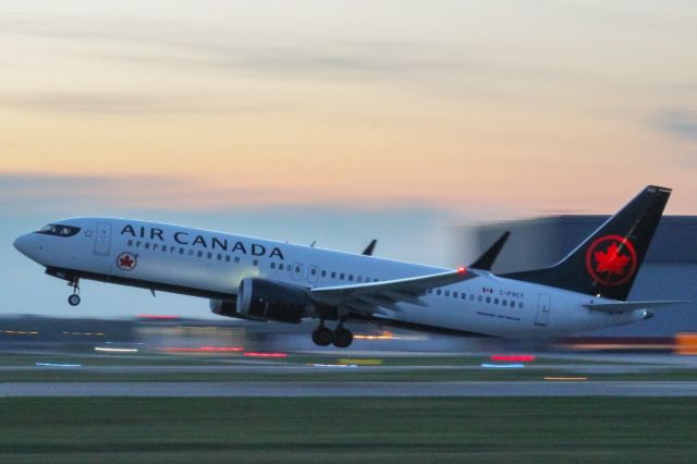 Boeing 737 MAX 8 (C-FSCY) - An Air Canada 737 MAX 8 leaving YUL.