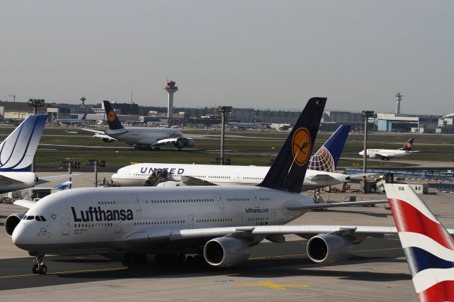 Airbus A380-800 (D-AIMC) - D-AIMC ad back D-AIME, a normal day in Frankfurt. Visit the observation deck, terminal 2 for this good views!!!