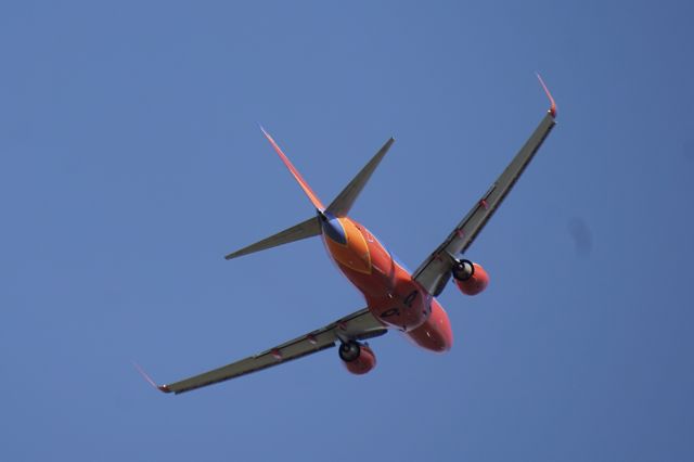 Boeing 737-700 (N740SW) - Photo taken from departure end of 16R. 1998 manufacture