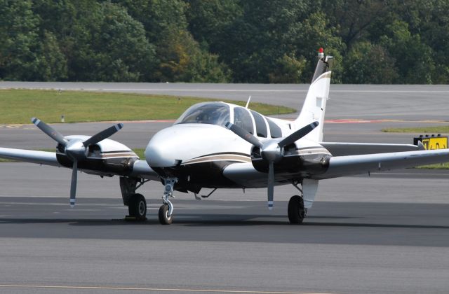 Beechcraft 55 Baron (N592SS) - SSI EQUIPMENT LLC at KJQF - 10/10/14