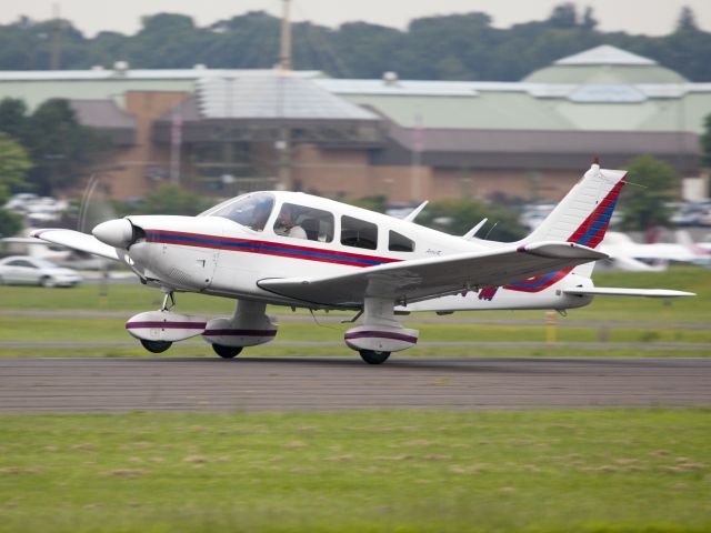 Piper Cherokee (N106FM) - Take off runway 26.