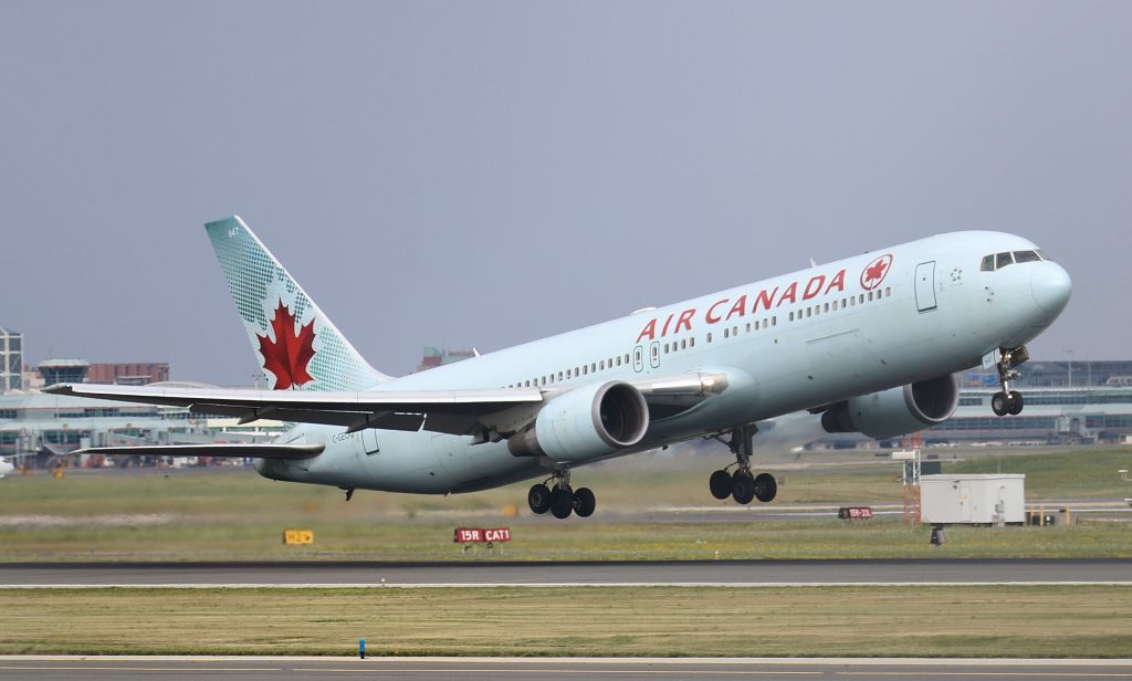 BOEING 767-300 (C-GEOQ) - Rotating off Rwy 23 Pearson.