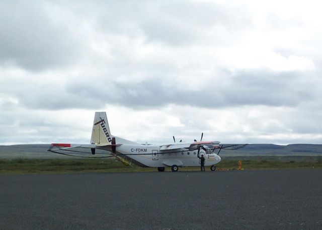 NURTANIO Aviocar (C-FDKM) - Checking plane at Kugluktuk Airport - Kugluktuk, Nunavut