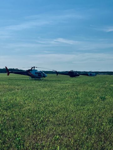 — — - Multiple Helicopters parked in NW Field for Forestry Operations