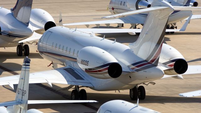 Bombardier Global 5000 (N110QS) - Remote  parking area for Final Four visitors.