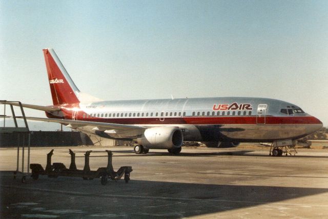 BOEING 737-300 (N391AU) - Seen here in Mar-88.  Reregistered N522AU 10-Nov-88.  Registration cancelled 12-Feb-08.  Broken up at KGWO.