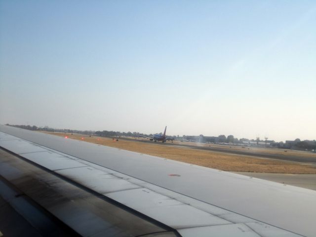 Boeing 757-200 (N675AN) - SWA just landing as we line up and wait