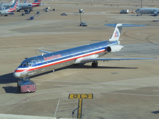 McDonnell Douglas MD-82 (N70504) - American Airlines (AA) N70504 MD-82 [cn49798]br /Dallas-Fort Worth (DFW). American Airlines flight AA2533 pushes back for departure to Fresno (FAT). This classic bare metal livery, first deployed in the late 1960’s was replaced by a new white livery in 2013 following the merger with US Airways. The MD ‘Super’ 80 fleet was not repainted due to imminent retirement. After completing 40,279 cycles this aircraft’s last revenue flight was in August 2016, since when it has been stored at Roswell (ROS).br /2016 01 28   a rel=nofollow href=http://alphayankee.smugmug.com/Airlines-and-Airliners-Portfolio/Airlines/AmericasAirlines/American-Airlines-AAhttps://alphayankee.smugmug.com/Airlines-and-Airliners-Portfolio/Airlines/AmericasAirlines/American-Airlines-AA/a