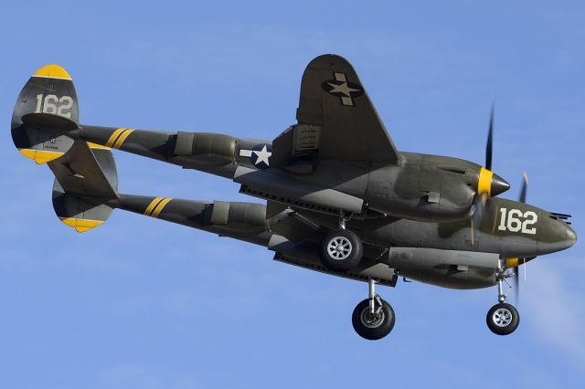 Lockheed P-38 Lightning (NX138AM) - Lockheed P-38J Lightning NX138AM 23 Skidoo at Luke AFB on March 13, 2014.