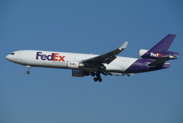 Boeing MD-11 (N604FE) - Final Approach to Narita Intl Airport Rwy34L on 1997/01/17