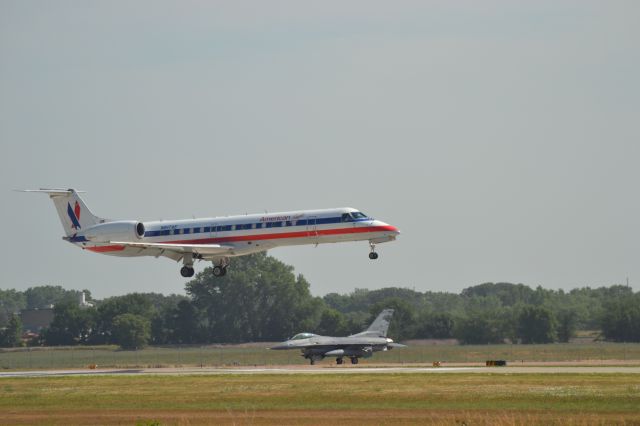 Embraer ERJ-135 (N817AE) - Landing KFSD with a F-16 of the SD Air Guard prepping launch - 7-17-2012