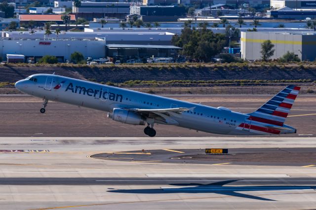 Airbus A321 (N942US) - American Airlines A321 taking off from PHX on 11/5/22. Taken with a Canon 850D and Tamron 70-200 G2 lens.