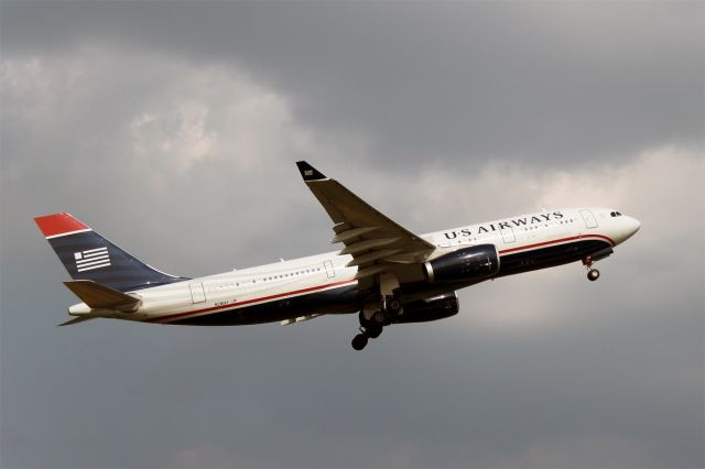 Airbus A330-200 (N281AY) - Climbing out of Charlotte, North Carolina USA for Paris, France