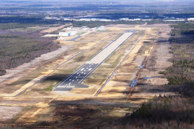 — — - CYRQ with new threshold for a total runway of 9000ft  threshold 05 2000ft added and 23 1000ft added