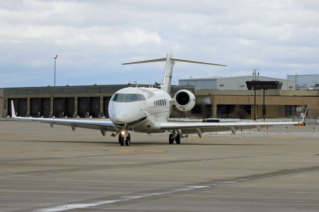 Bombardier Challenger 300 (N945AC) - FWK945 (N945AC, cn 20442) pulling in to Pad-1 for deicing on 7 Apr 2017.