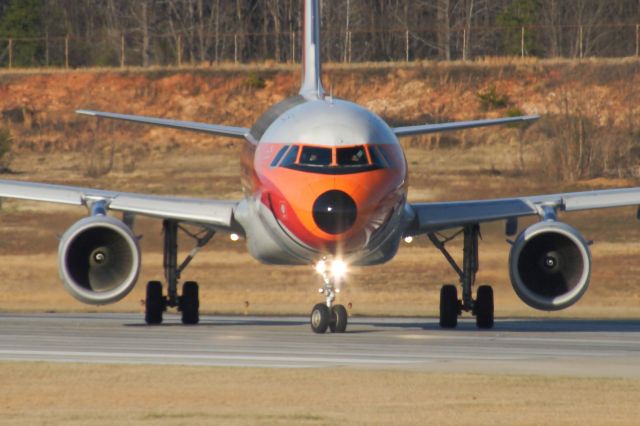 Airbus A319 (N742PS) - My daughter loves the smiley face livery!