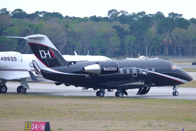 Canadair Challenger (N400DH) - Denny Hamlins personal Challenger 601 seen here parked on runway 16, awaiting the drivers arrival after the Daytona 500.