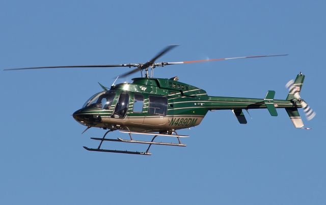 Bell 407 (N489DM) - Bell 407 owned by Chaparral Air Group, but known to do aerial surveillance operations for the DEA. This shadowy bird was arriving for the Alliance Fort Worth Airshow in formation with MD-369E N16069 10/09/2018 (please view in "full" for highest image quality)