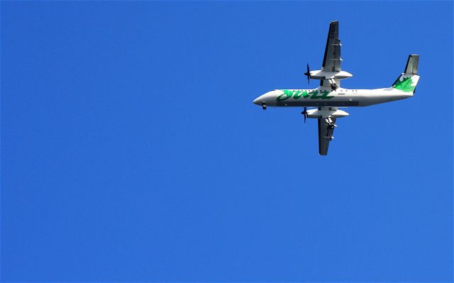 de Havilland Dash 8-300 (CS-FOU) - Jazz on approach over Ladysmith harbour - March 2011