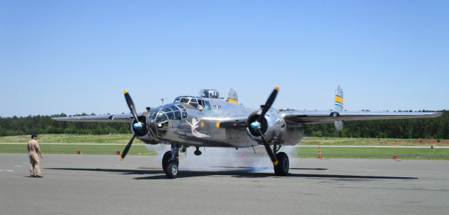 North American TB-25 Mitchell (N27493) - With one more puff of smoke... B-25 "Miss Mitchell" at the Commemorative Air Force fly-in at Raleigh Executive Jetport (TTA), Sanford, NC 5/14/17