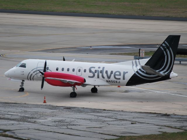 Saab 340 (N450XJ) - Parked on the ramp at Atlantic Aviation - 4/5/13