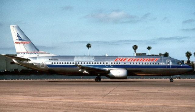 BOEING 737-400 (N408US) - scanned from postcard