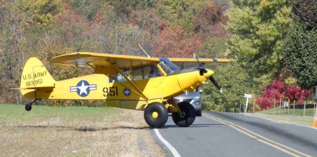 N1383W — - The right of way goes to this 1954 Piper L-21B PA-18-135 Super Cub upon landing as it rolls toward the airports grass field from the Autumn of 2022.