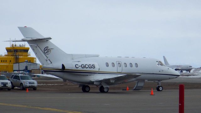 Hawker 800 (C-GCGS) - Snowing in Iqaluit, Nunavut. CargoJet in the background