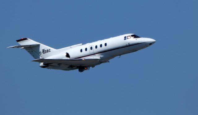 Hawker 800 (C-GDBC) - Shown here departing is a Hawker-Beechcraft 125-800A in the Spring of 2018.