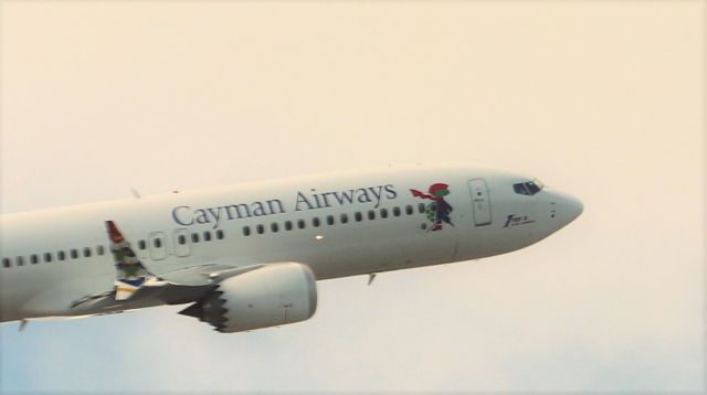Boeing 737 MAX 8 (VP-CIX) - 082022 departing Rwy 8R., nose art states first MAX delivered to a Caribbean airline