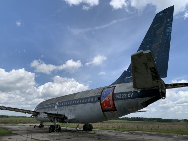 Boeing 737-700 (N322XV) - Found in an obscure boneyard. 