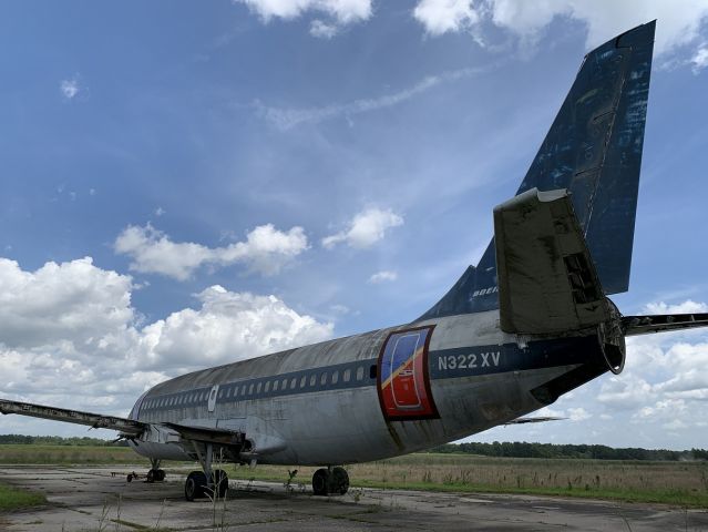 Boeing 737-700 (N322XV) - Found in an obscure boneyard. 