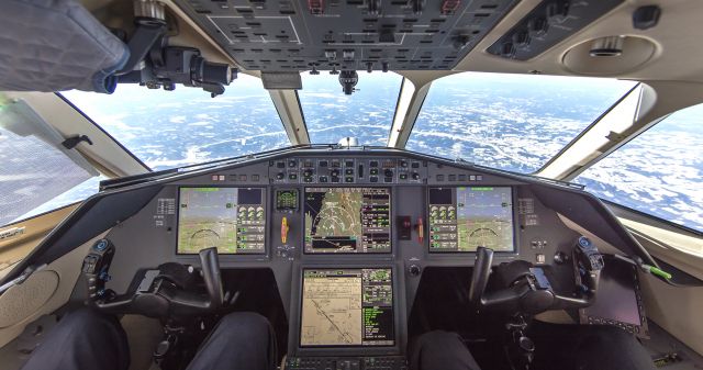 Airbus A320 (VP-BPW) - Wide angle view through Falcon cockpit inbound to KBMN at FL40 - cold outside and on ground too!