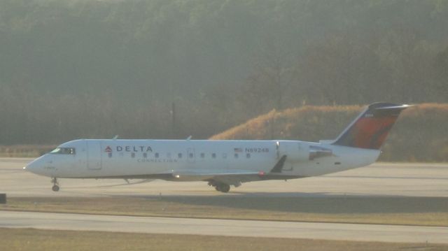 Canadair Regional Jet CRJ-200 (N8924B) - Delta 3690 turning off runway 23R.  Taken December 11, 2014. 
