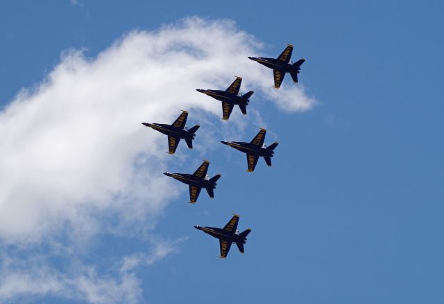 McDonnell Douglas FA-18 Hornet — - LINDEN, NEW JERSEY, USA-APRIL 28, 2020: Seen flying in formation near Linden Airport were the United Sates Navy Blue Angels. Together with the USAF Thunderbirds, they participated in Operation America Strong, a flyover salute to frontline COVID-19 responders.