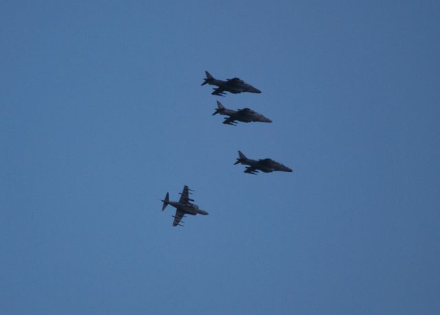 Cessna Citation Excel/XLS (KCLT) - Unusual scene as 4 Harriers fly over the runway and bank out one at a time for a left downwind to 18L - 8/27/10