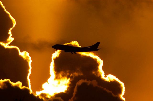 Boeing 747-400 (G-VFAB) - 12/9/12:  Virgin flight #5 on short final approach to runway 12 in the late afternoon at MIA on a flight from LHR.  Photo taken from my balcony in Miami Lakes.