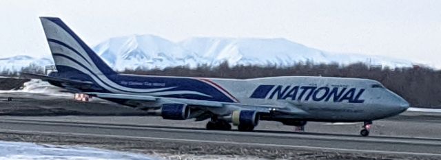 Boeing 747-400 (N952CA) - Former Kulis Air National Guard fire station, Anchorage International Airport