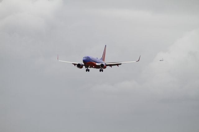 Boeing 737-700 (N635SW) - Southwest N635SW lands as company traffic follows him in.