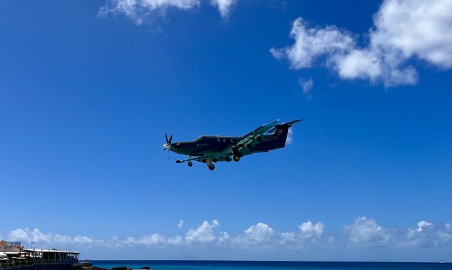 Pilatus PC-12 (F-OSXM) - F-OSXM, operated by St. Barth Executive, on very short final @ SXM/TNCM. 3/21/22. 