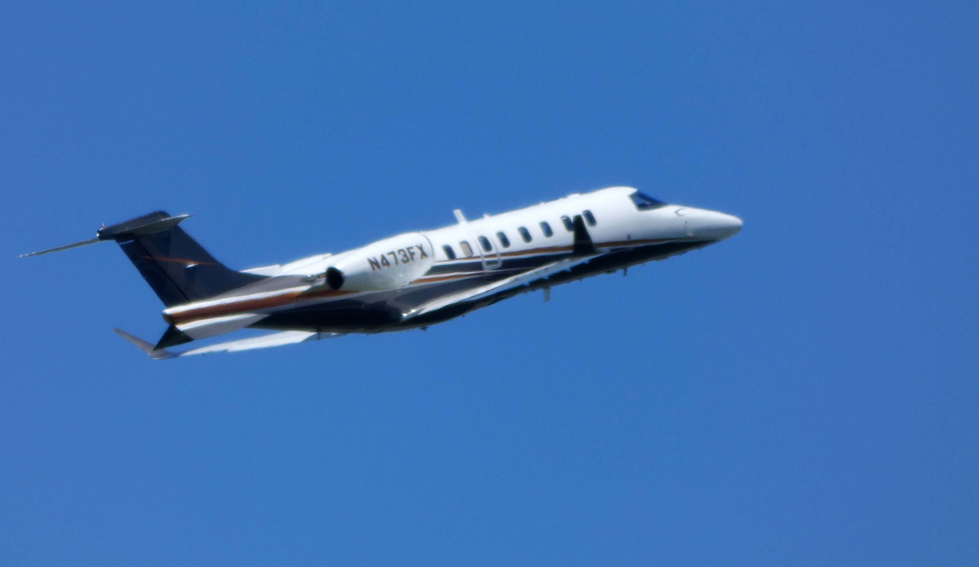 Bombardier Learjet 75 (N473FX) - Shown here departing is a 2015 Learjet 75 in the Summer of 2018.