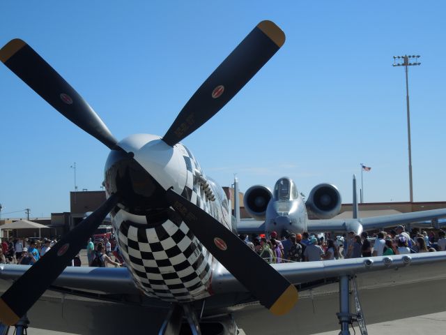 North American P-51 Mustang — - A Mustang with an A-10 Lightning in the background at Thunder in the Desert 2014.