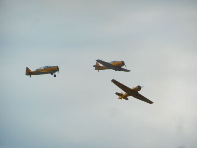 North American T-6 Texan (KH918) - The Canadian Harverds showing how bad student pilots during WWII before they become world class Airmen. Leaseweb Manassas Airshow 2018br /br /it was a really good day, i mean we got lucky because it was supposed to (when i first saw about a few days before the airshow it said RAIN THE WHOLE DAY)  about four days eariler, i mean they had a little shower for about 10 minutes then all went well, we all got lucky that the weather hold out.br /br /honestly, i do not know how they keep the Landing Gear stuck like that! it was really good to see, this formation always makes me laugh :)br /br /make sure to comment and give this picture a good rating (BTW THANK YOU SO MUCH FLIGHTAWARE FOR GETTING MY DECATHOLAN STUNT PLANE PICTURE TO A STAFF PICK, I NEVER THOUGHT I WOULD GET THAT, but i thought it was my F-22 and P-51 picture, :) once again thanks so much, btw this is CP son, i use my dads account! thanks for the Staff Pick :) you have alot of cool pictures heading your way! :)