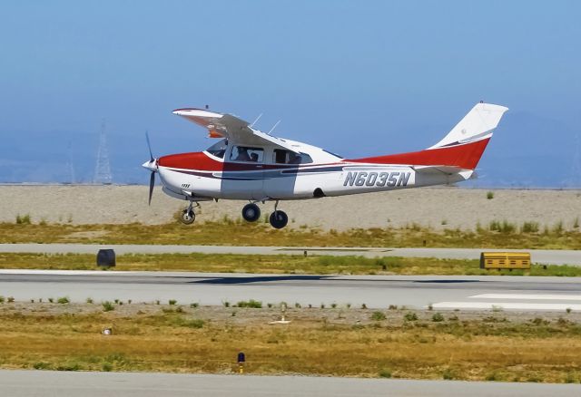 Cessna Centurion (N6035N) - Cessna 210M in new paint landing at San Carlos in 2015